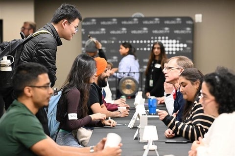 Paul Speed networking at innovation open house 