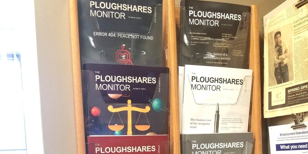 Ploughshares Monitor magazines on wall display