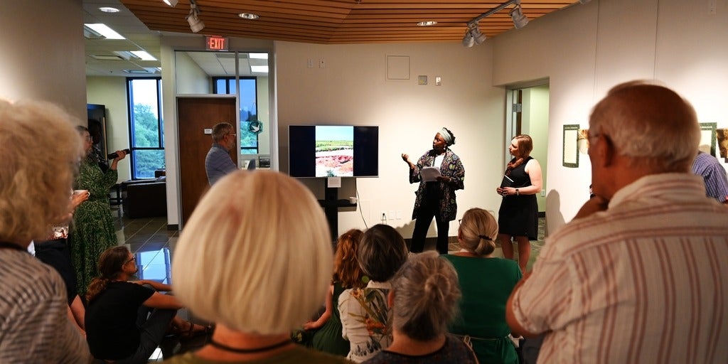 people listening to Ndagire and Leah presenting at the gallery 