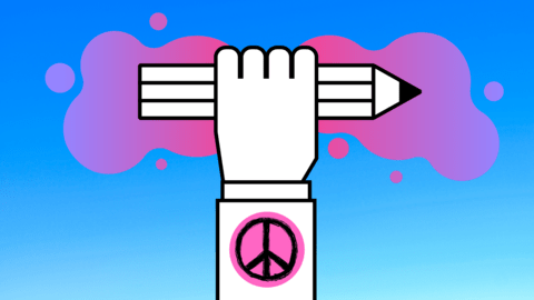 Hand holding a pencil with a peace sign on the sleeve