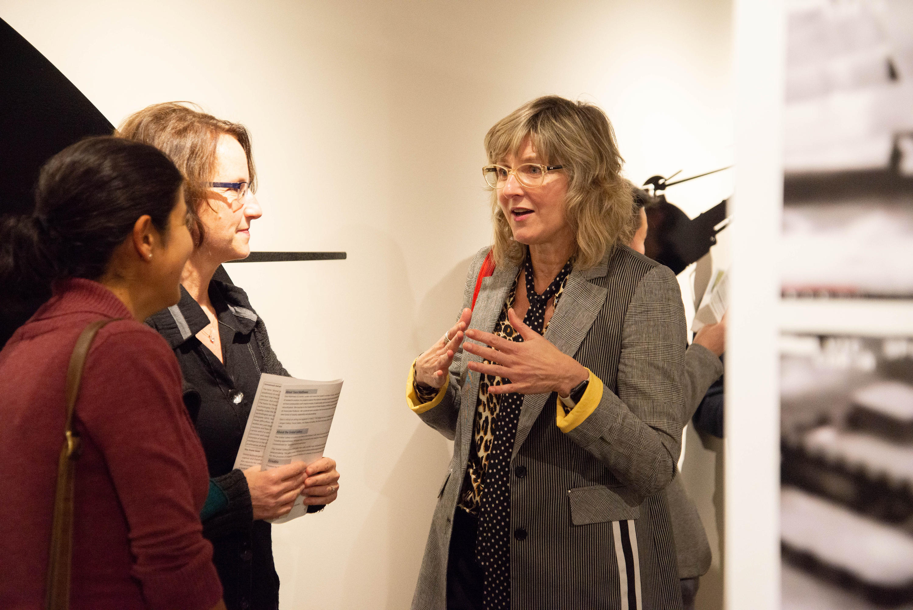 Artist Sara Matthews chats with guests 
