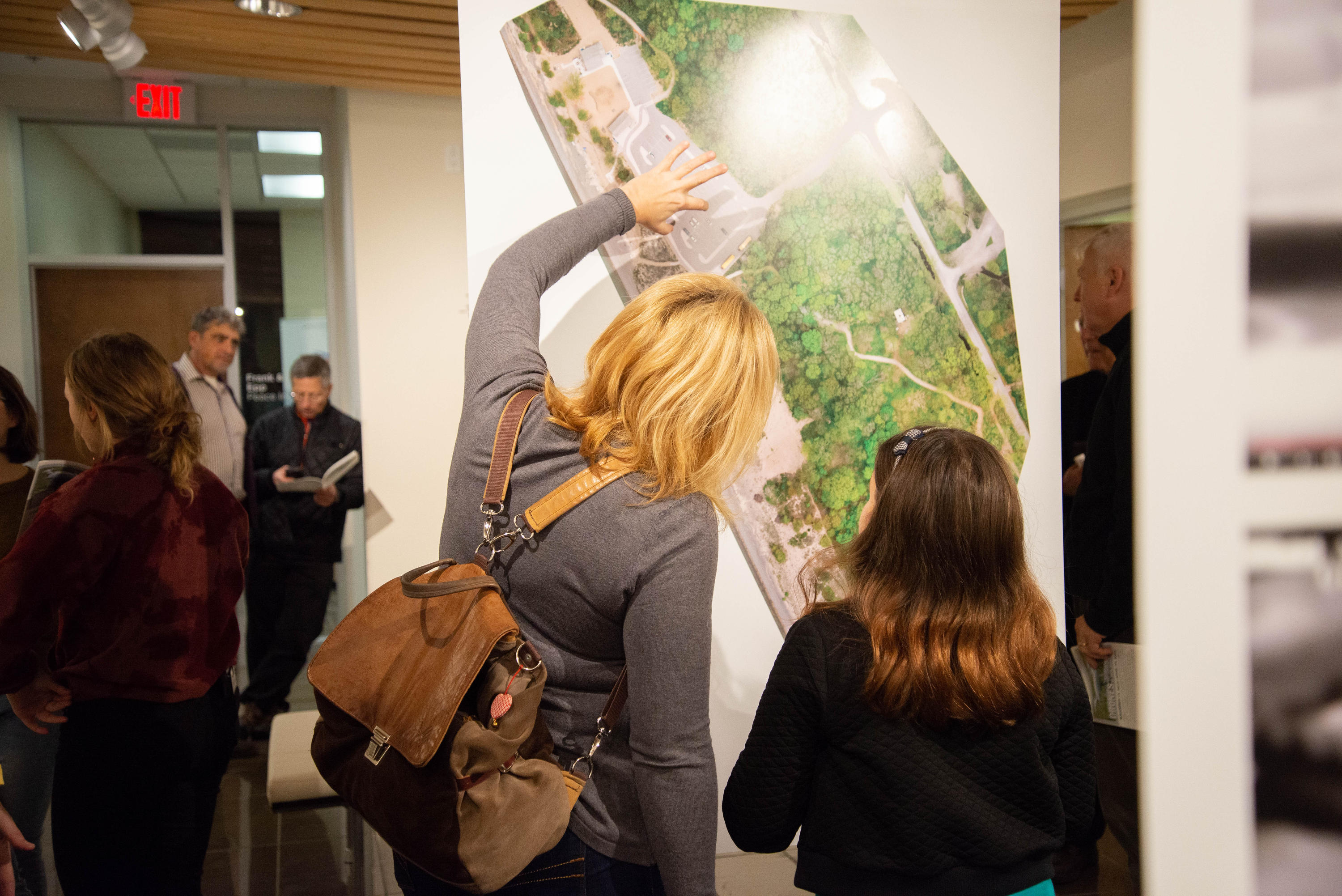 participant Trina King views art piece