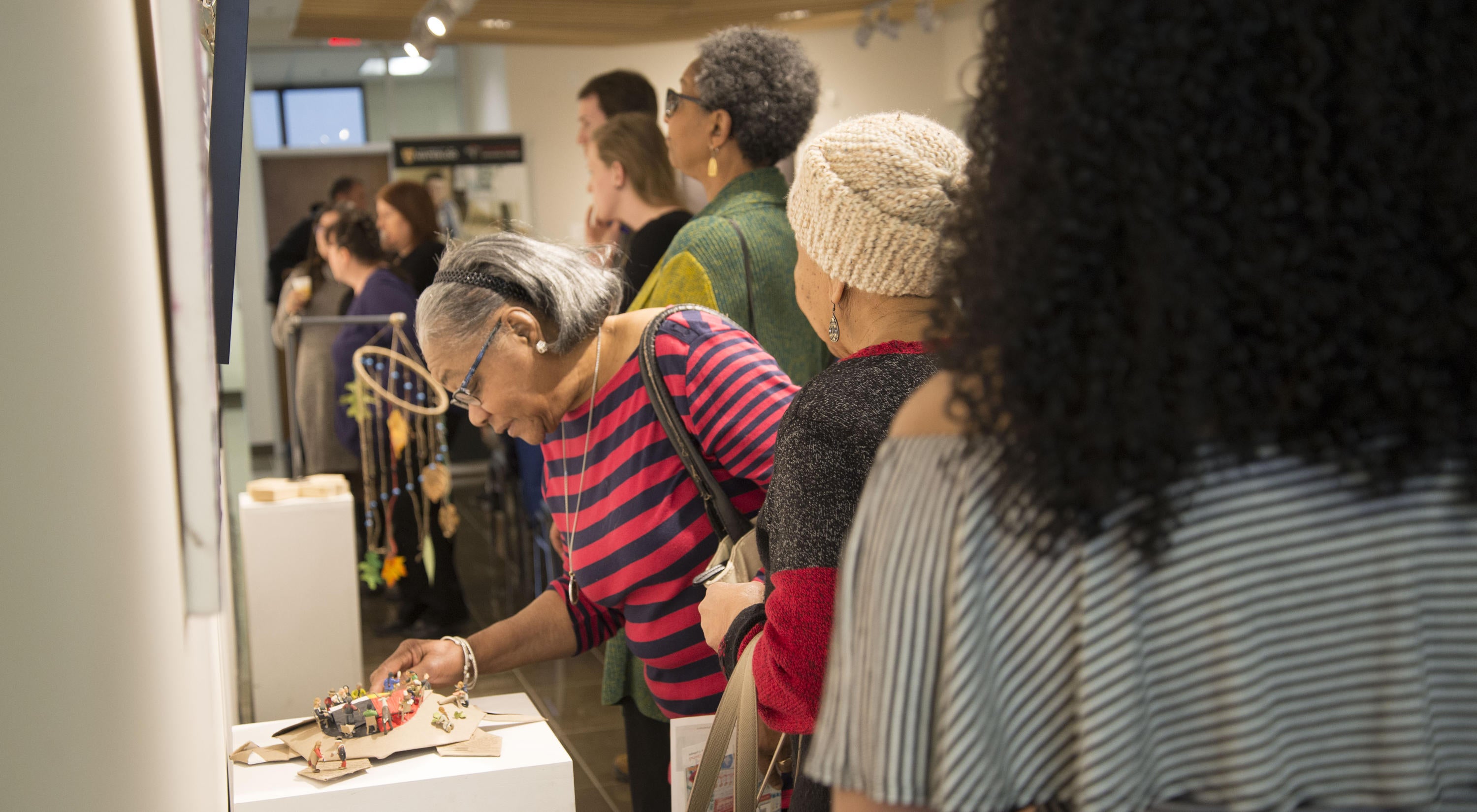 a guest looking at an exhibit