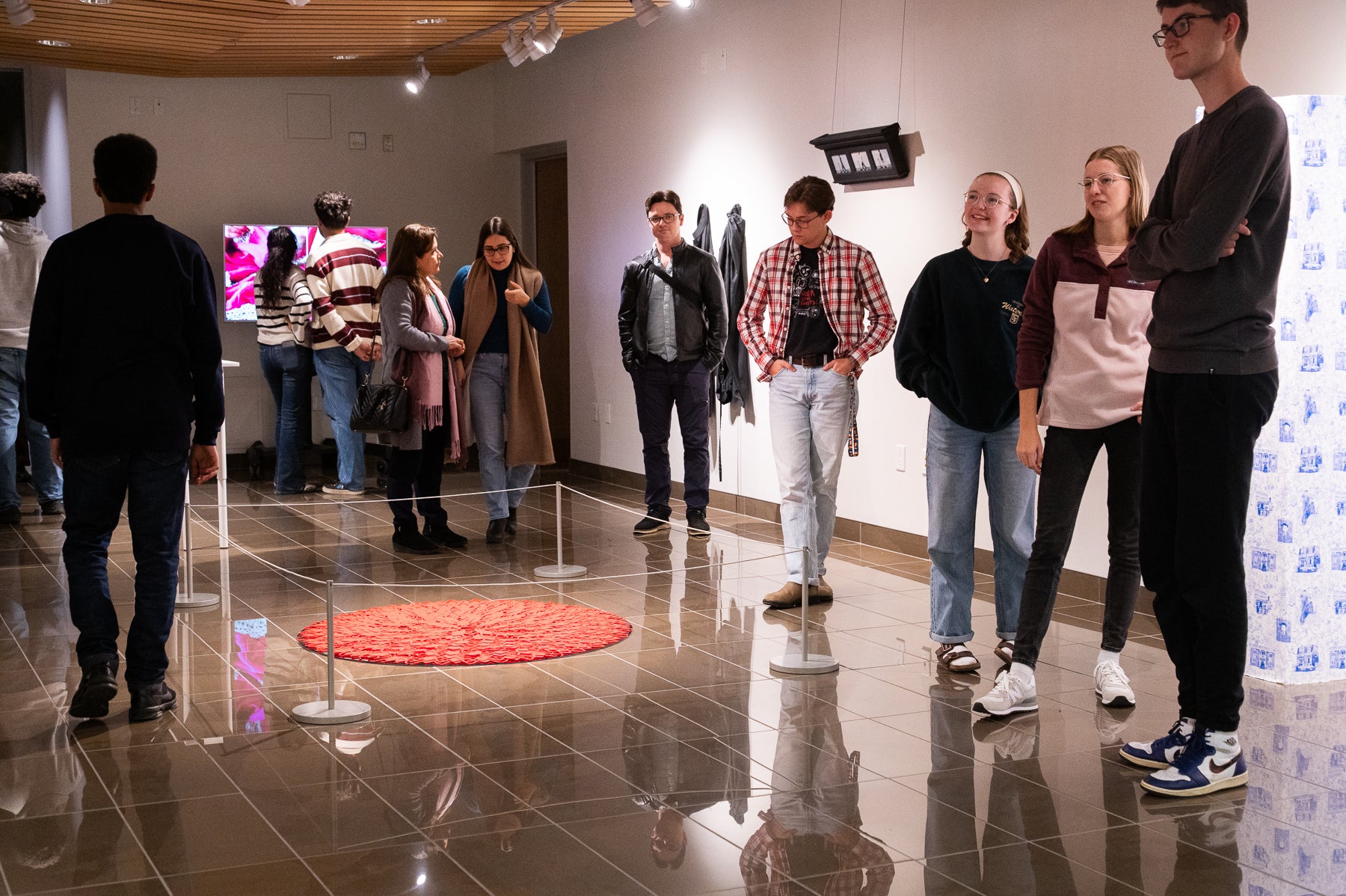 groups of people in a gallery