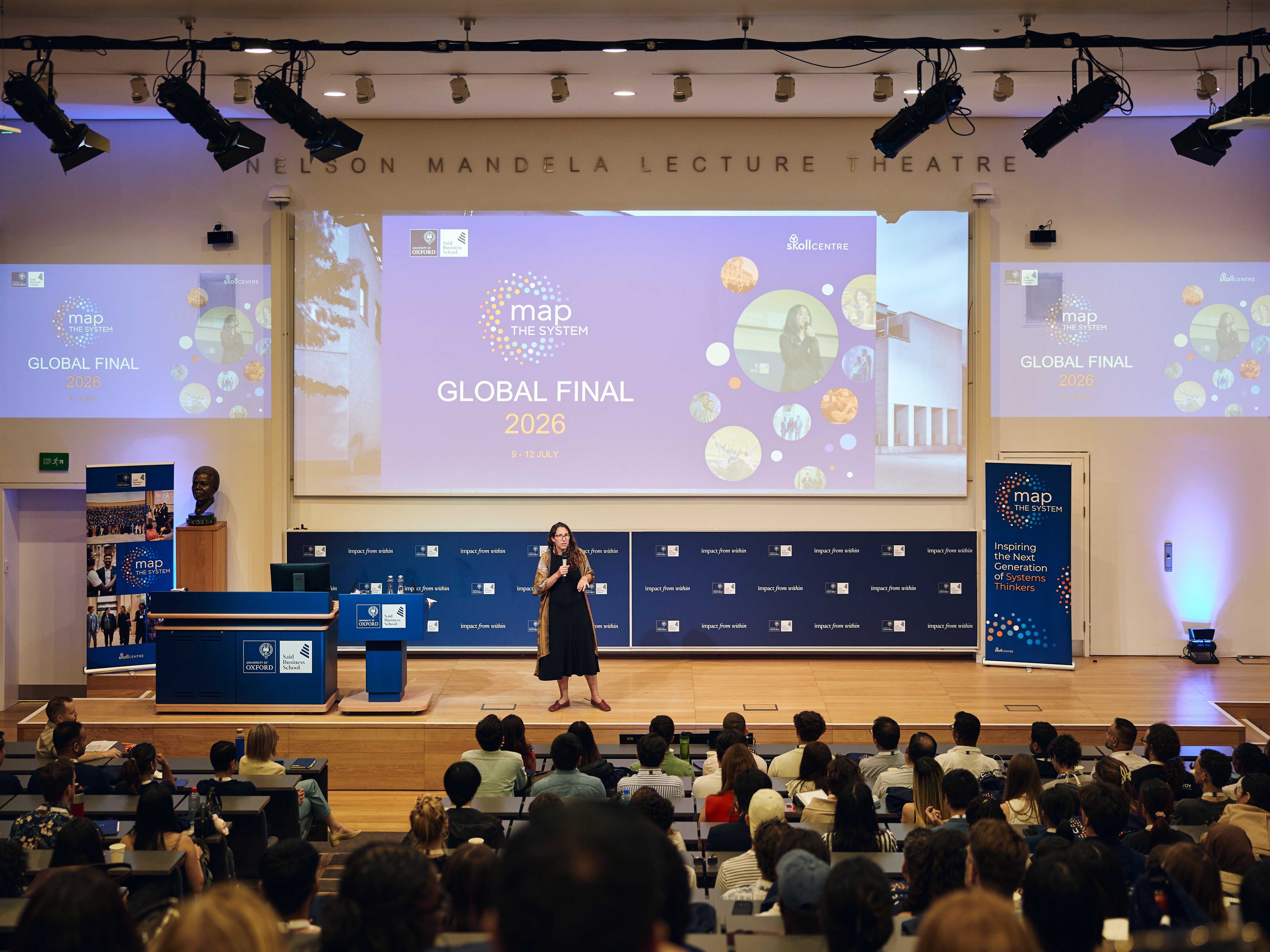 Daniela Papi Thornton speaks for an audience of Map the System finalists at Oxford University