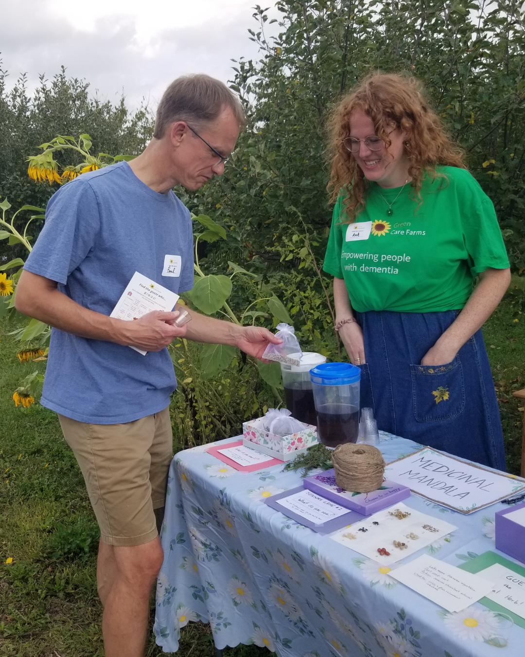 Guy holding bag of herbs