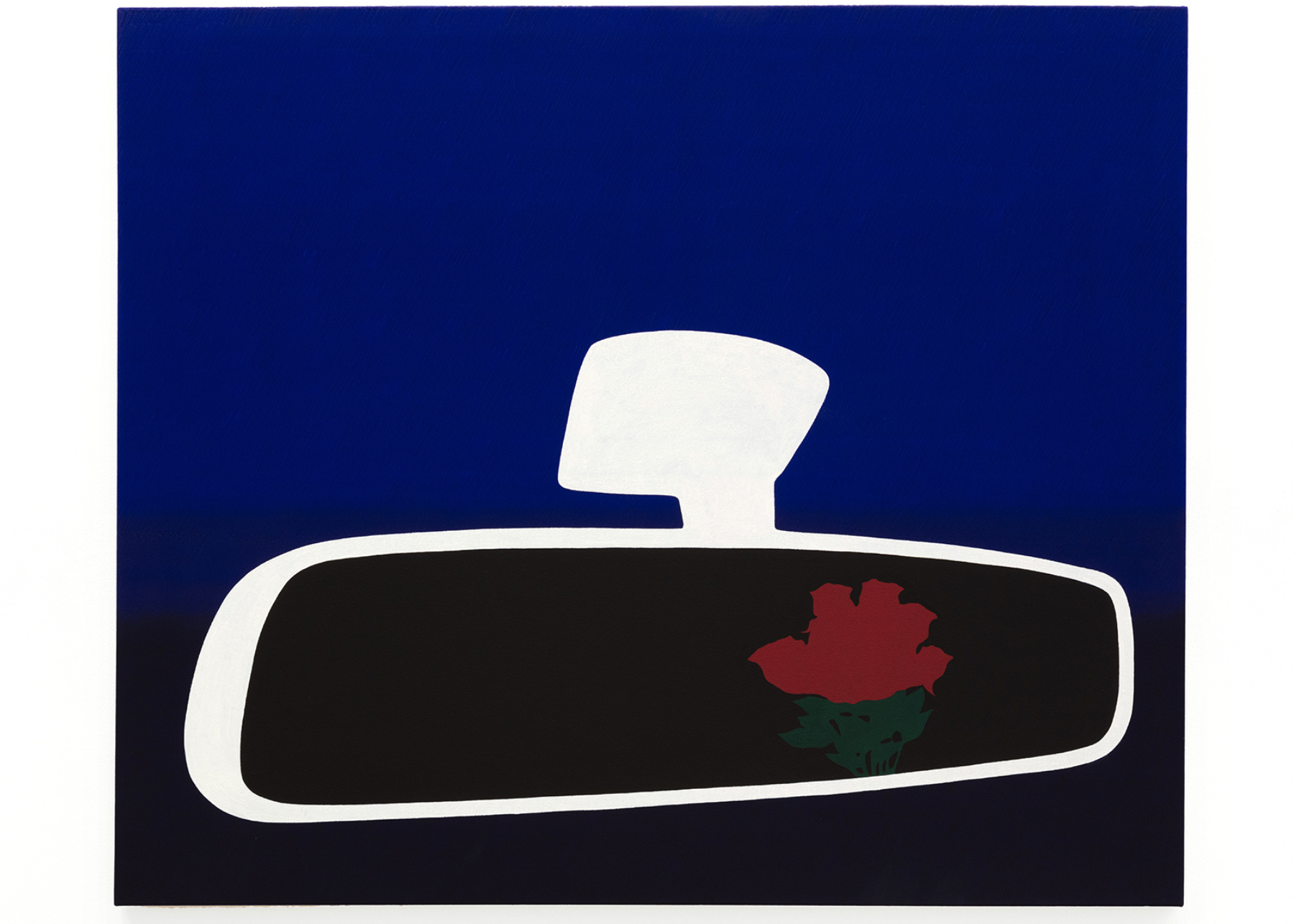 Car rear-view mirror with a flower in view