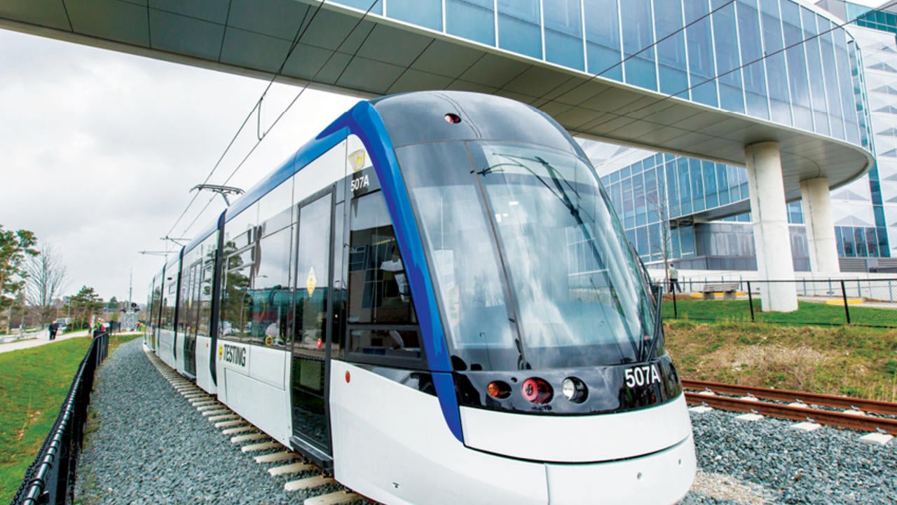 The Light Rail Transit ION Train drives through UWaterloo campus