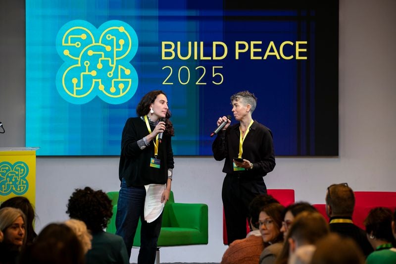 people opening at a conference