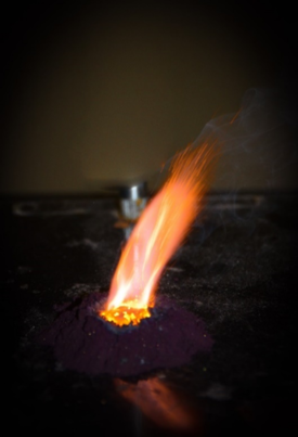 Orange flame on purple powder 1.