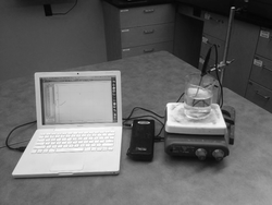 Computer collecting data from a beaker.