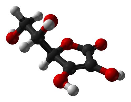 A ball-and-stick model of a vitamin C (ascorbic acid) molecule.