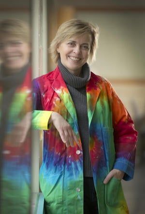 Jean Hein in a rainbow lab coat