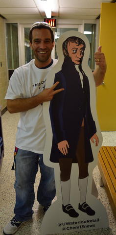 Rick Marta posing with a cardboard cut-out of Avogadro 