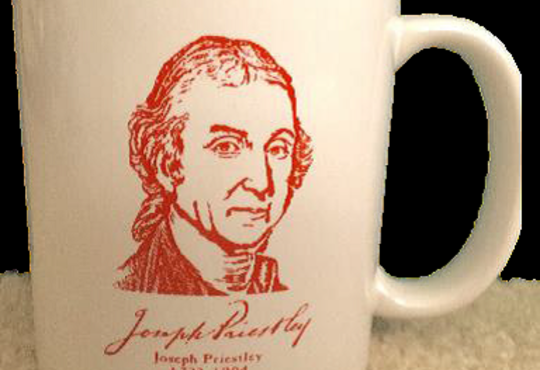 a white mug with a sketch of Joseph Priestley