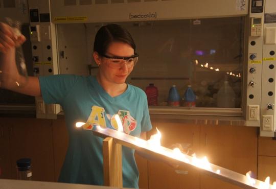 Student creating flames on a ramp.
