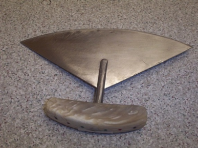 Triangle blade made of steel.