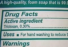 Corner of drug facts label showing triclosan as active ingredient.