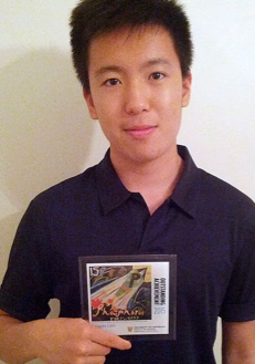 A student showing an award.