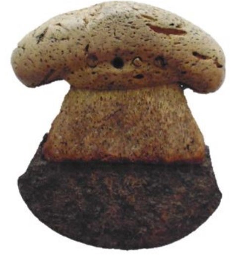 an ancient rusted iron-bladed ulu