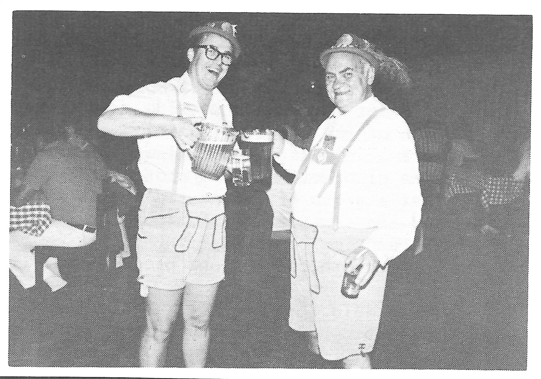 Reg Friesen and L.H. Sibley sharing a beer at ChemEd 1975