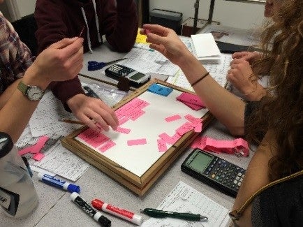 A chemistry card game in action.
