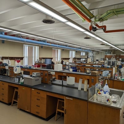 lab with wooden desks and glass equipment