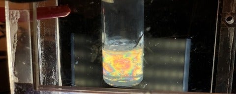 gel in test tube with colourful swirls