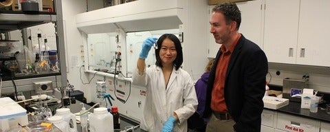 Professor Michael Pope working with student in his lab