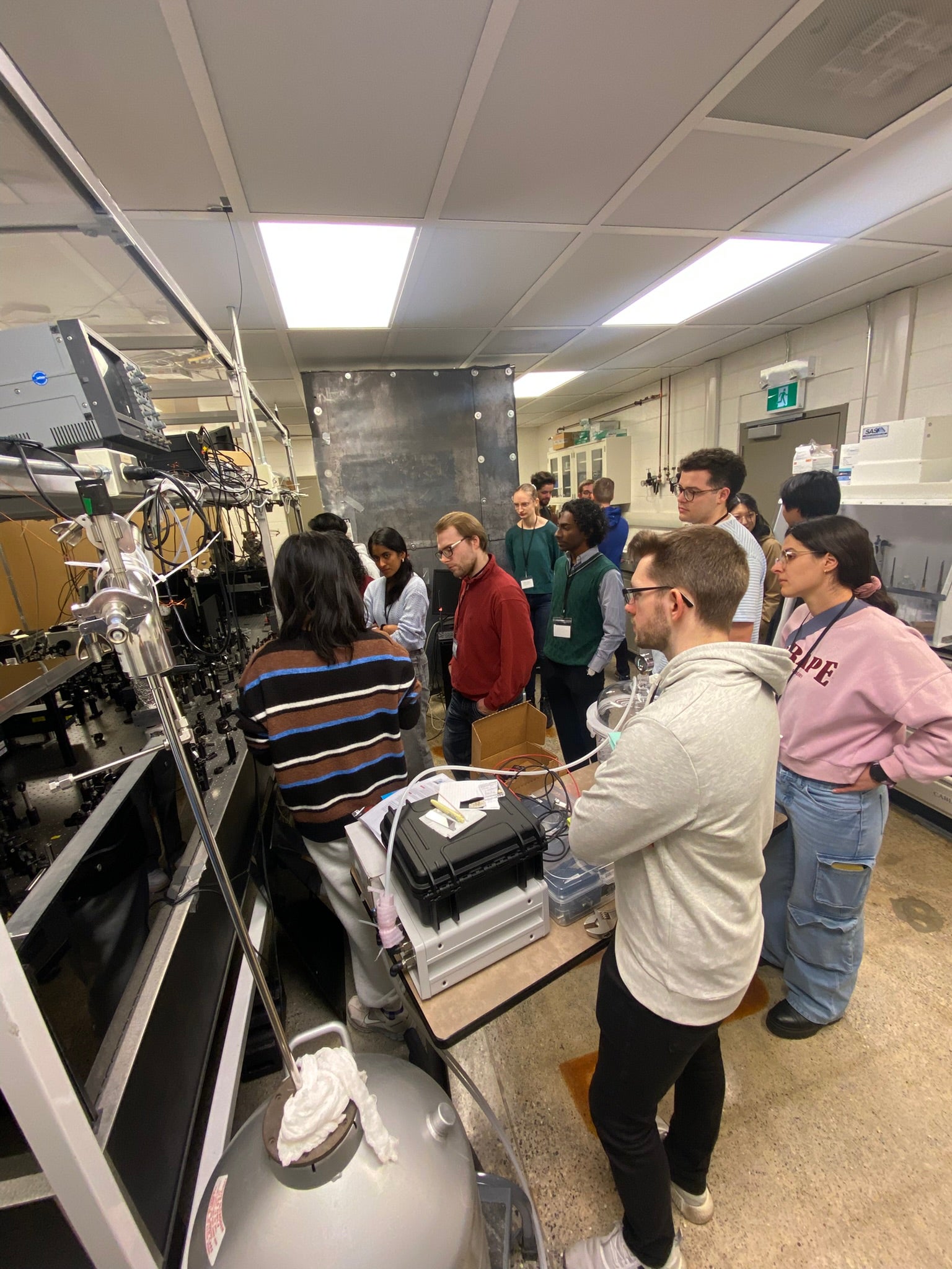 People looking at equipment