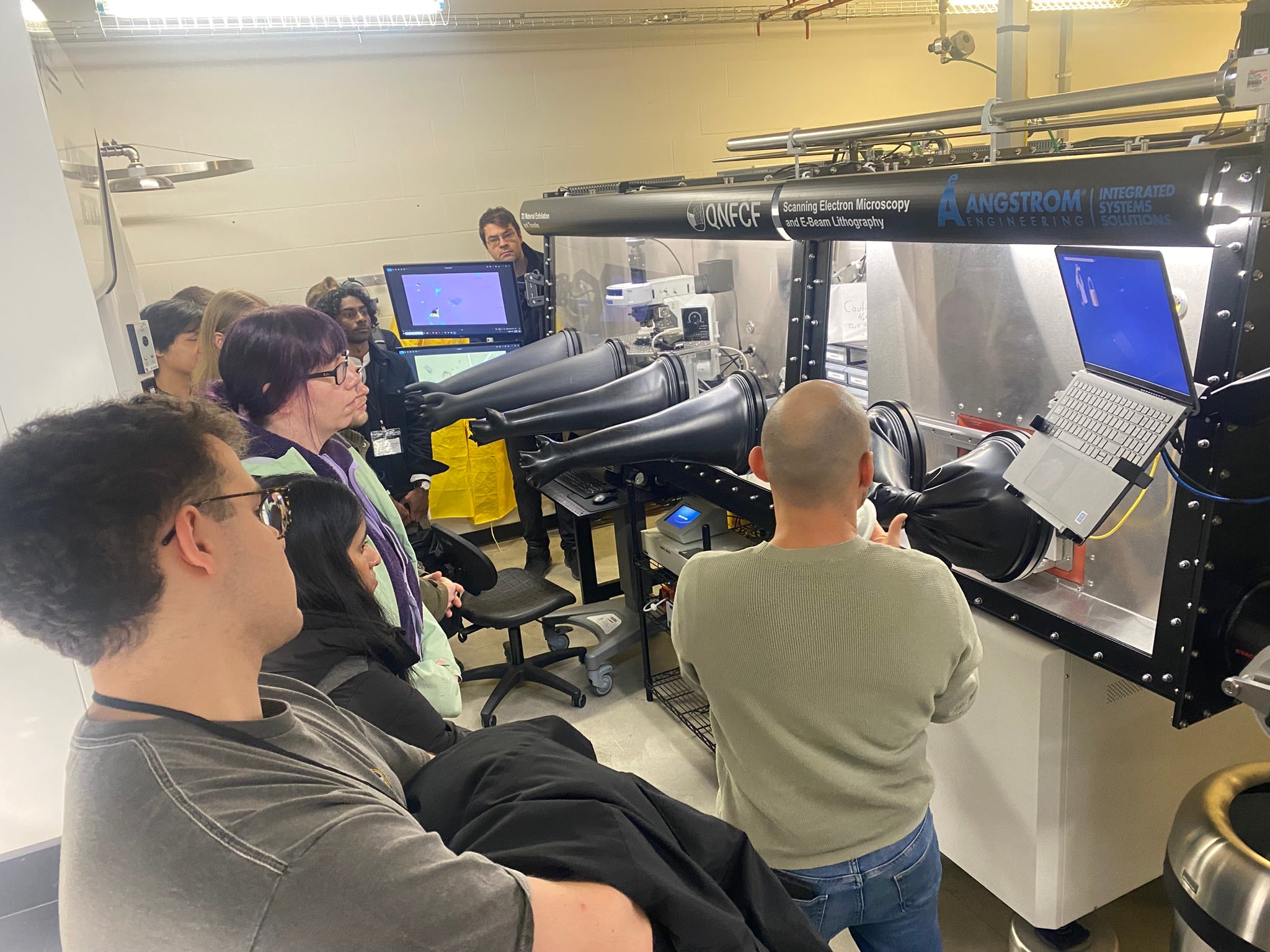 People looking at a glove box