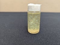 a small vial of glitter