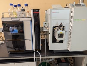 lab equipment with glass bottles on top