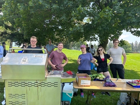 Chemistry graduate students barbequing.