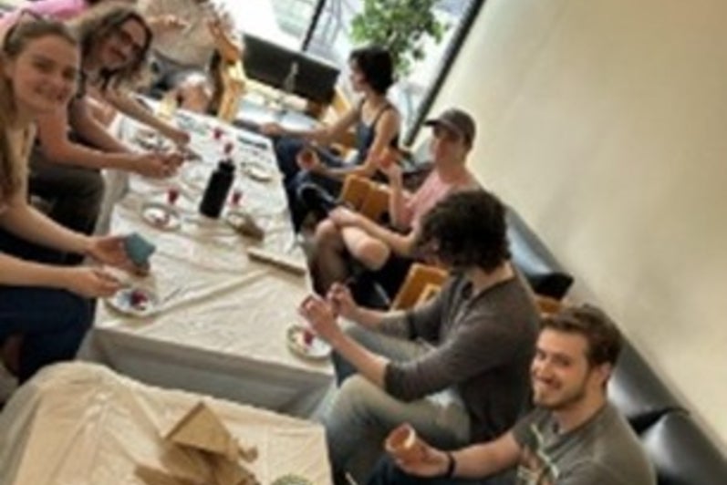 Students eating together at a restaurant.
