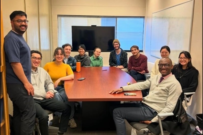Students around a seminar table.