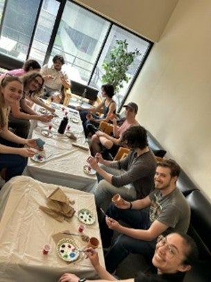 Students eating together at a restaurant.