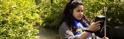 student doing field work