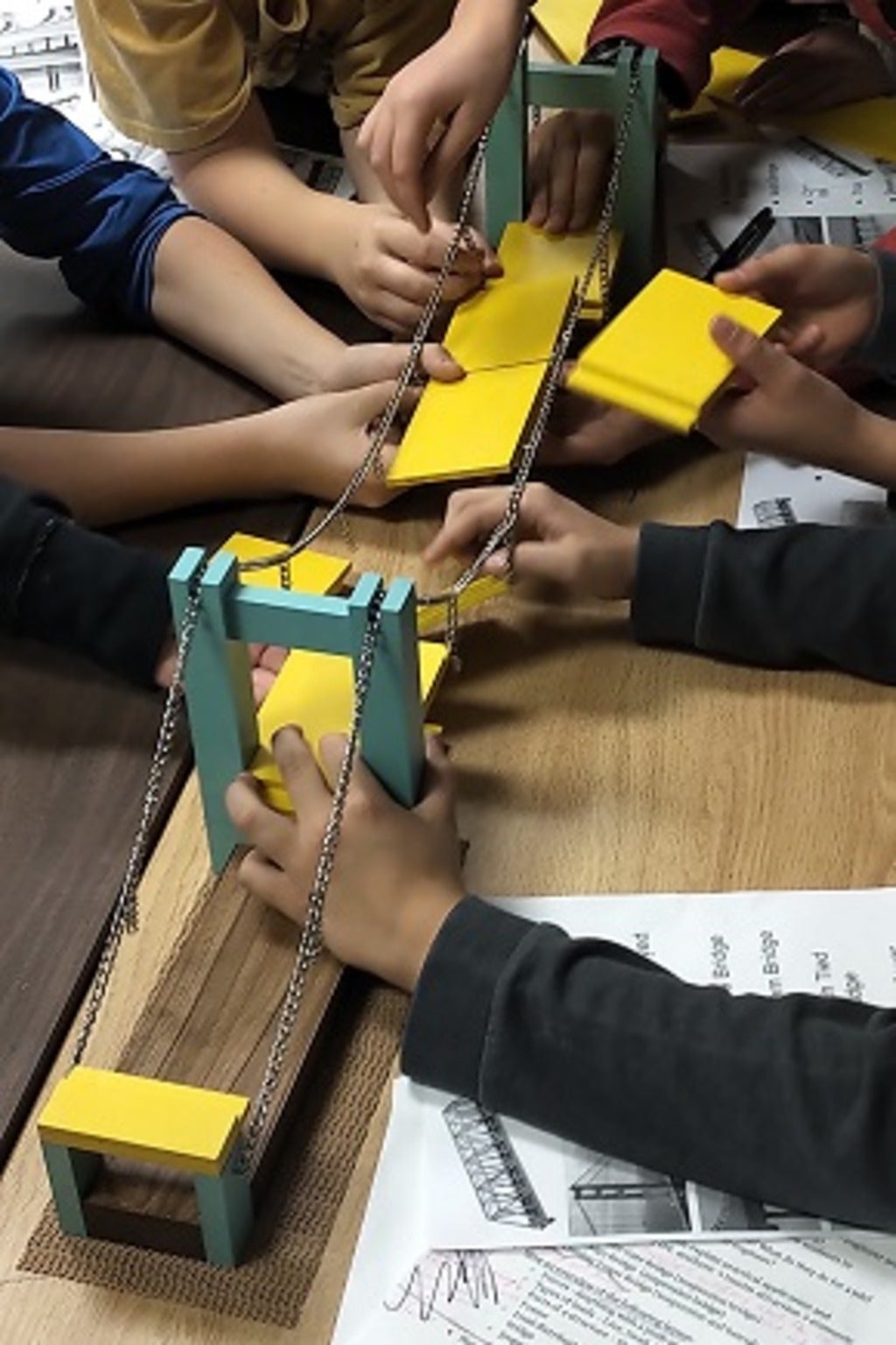 Students building a bridge