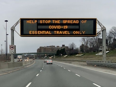 COVID-19  Highway message board sign