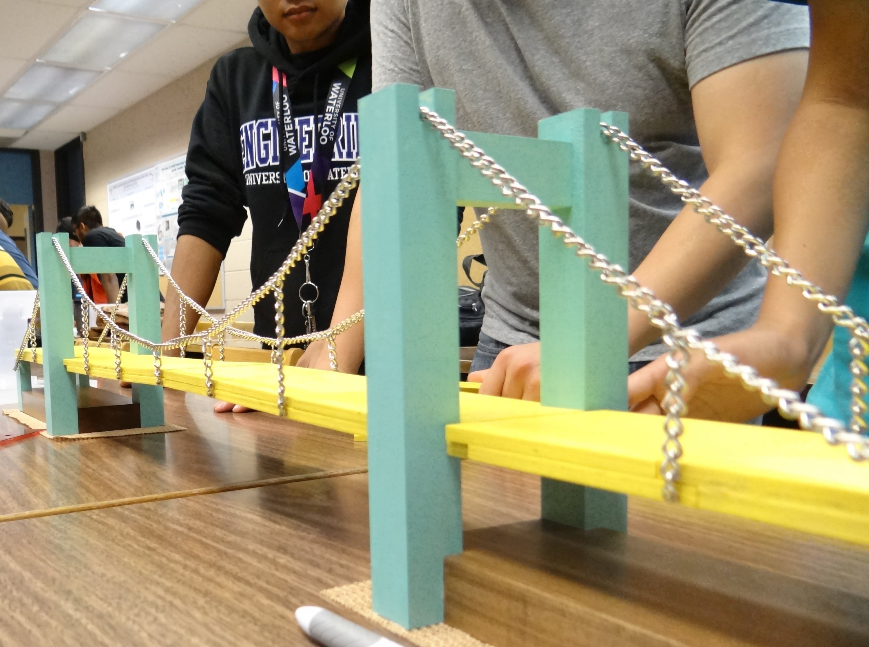 students testing bridge structure