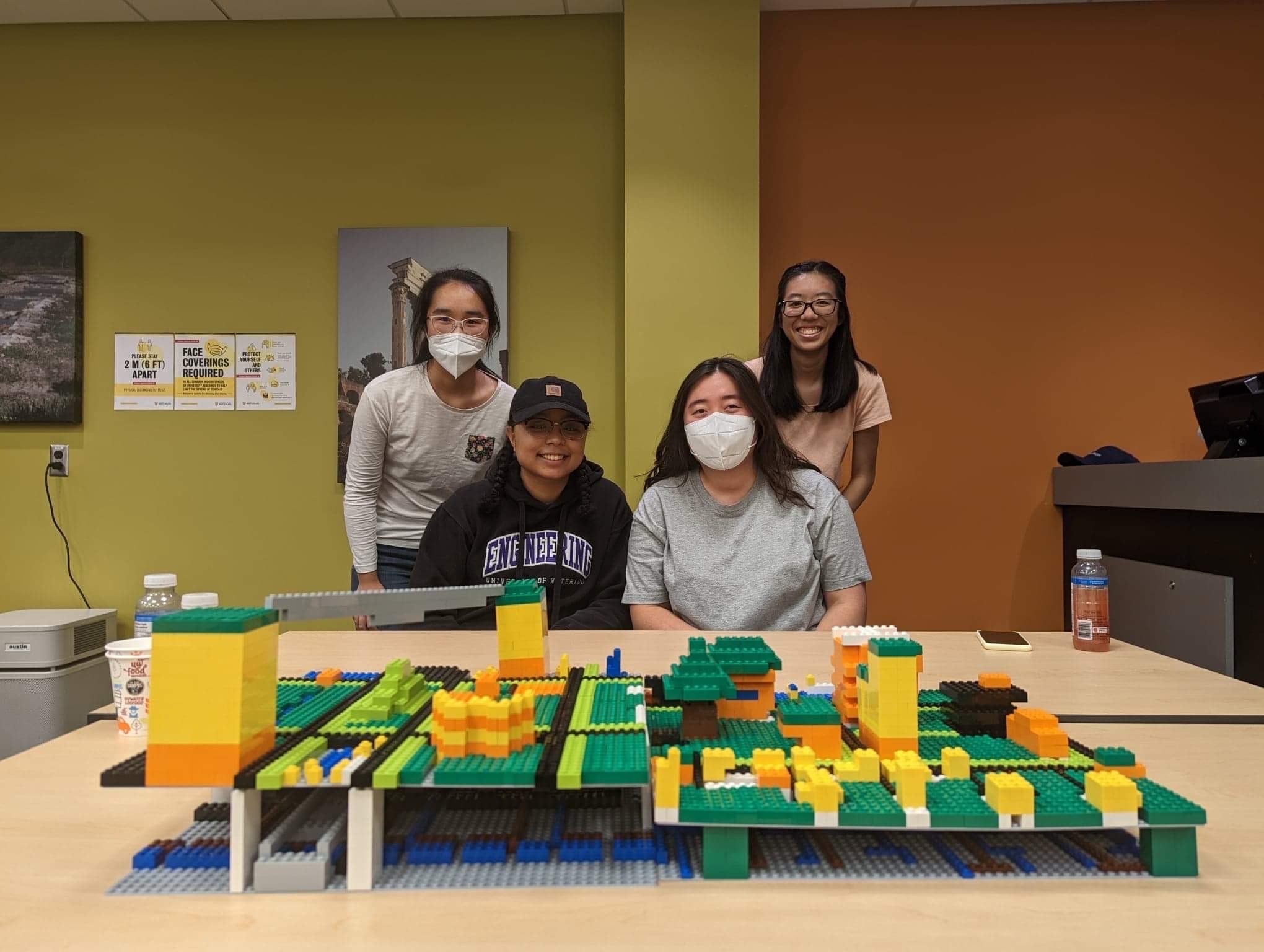 Four Students with Lego Structure