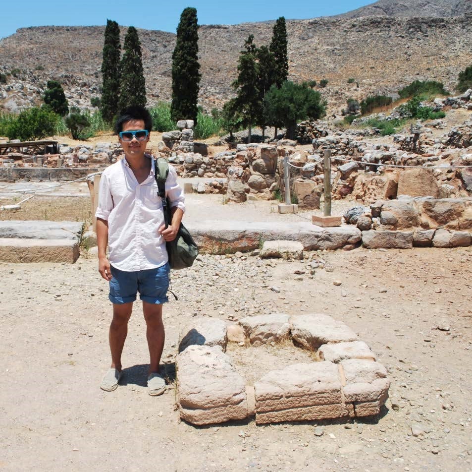 Jonathan Shen standing beside the alter, after his talk at Kato Zarko, Crete, Greece