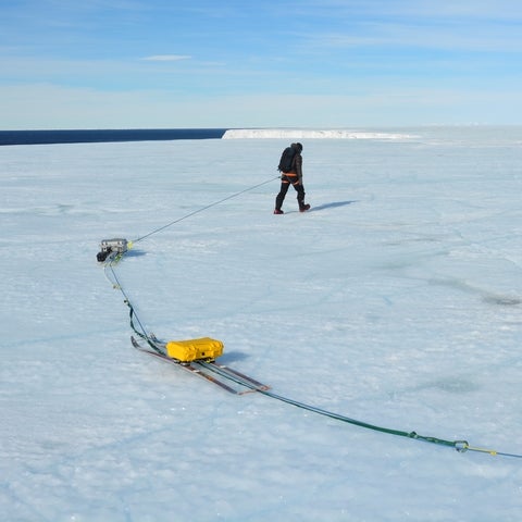 Christine Dow doing research in the Artic represents cliamte science, modelling and observation.