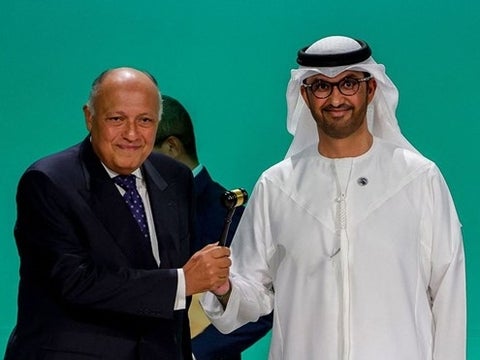 COP28 President Sultan Ahmed Al Jaber alongside Egyptian Foreign Minister and COP27 President Sameh Shoukry