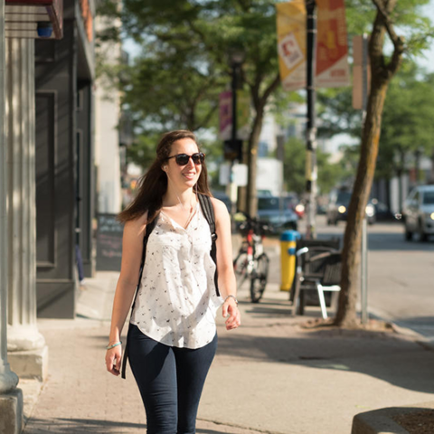 girl walking in uptown