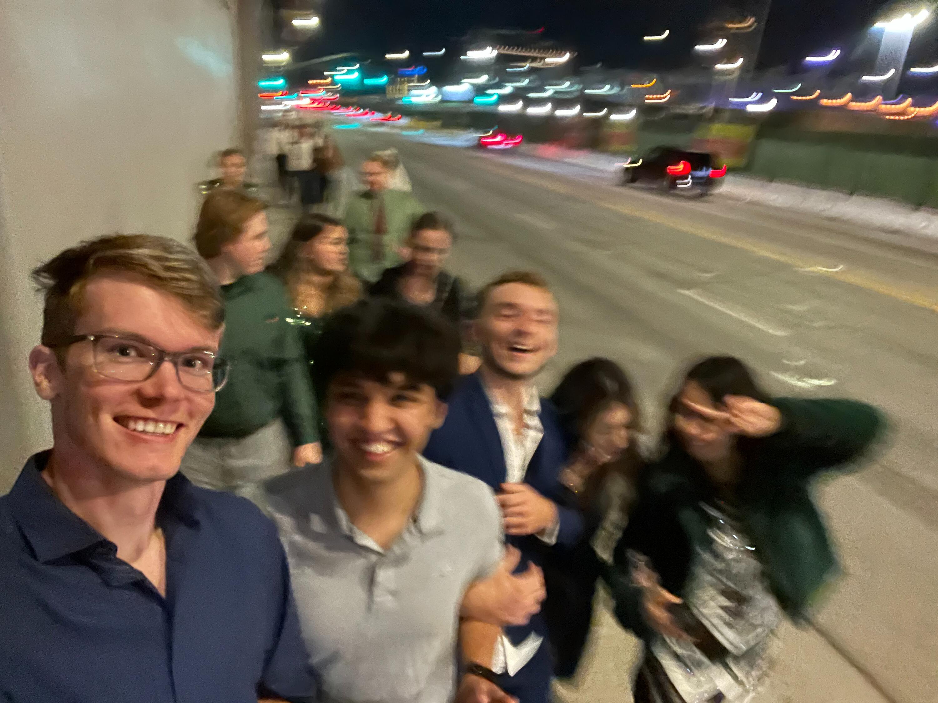 Sam and friends in downtown Los Angeles at night.