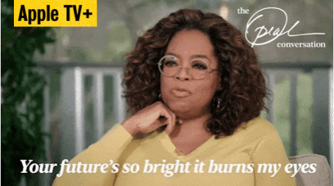 GIF of Oprah Winfrey speaking, with the caption &quot;Your future's so bright it burns my eyes&quot;, the text &quot;The Oprah Conversation&quot; on the top right, and the credit tag &quot;Apple TV+&quot; located on the top left.