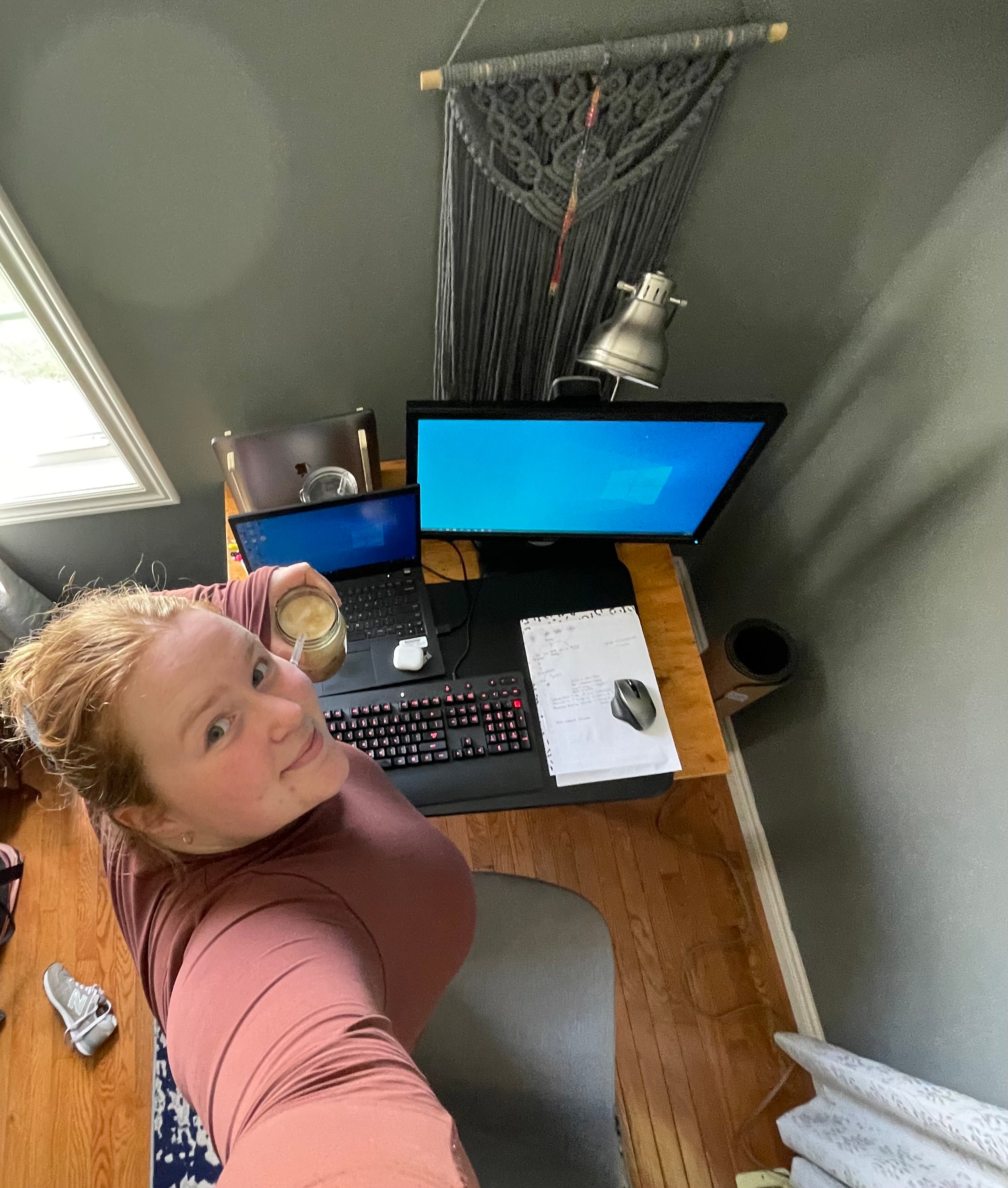 An overhead selfie of Aisley Ellis working from home