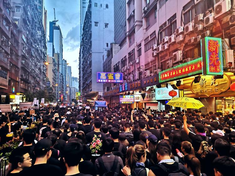 Photo taken by Trenton walking the streets in a crowd in Hong Kong